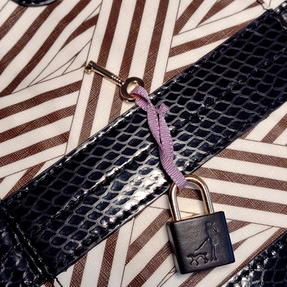 Henri Bendel Disturbed Stripe weekender with lock - Picture 13 of 16